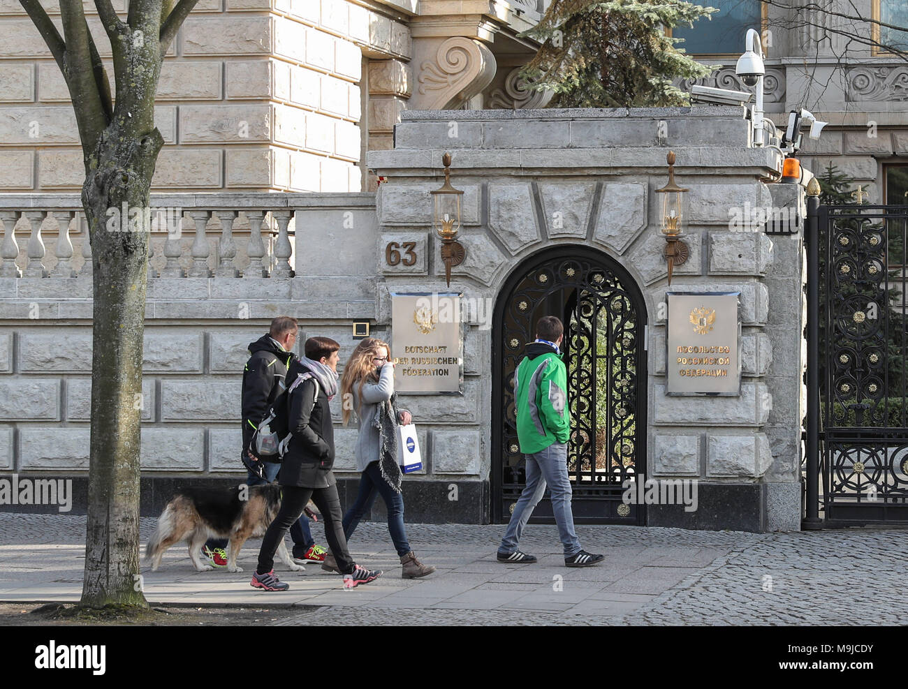 Berlin, Germany. 26th Mar, 2018. Pedestrians pass by Russian Embassy in Berlin, capital of Germany, on March 26, 2018. Germany announced Monday that it will expel four Russian diplomats over the poisoning of former double agent Sergei Skripal and his daughter in Britain. Credit: Shan Yuqi/Xinhua/Alamy Live News Stock Photo