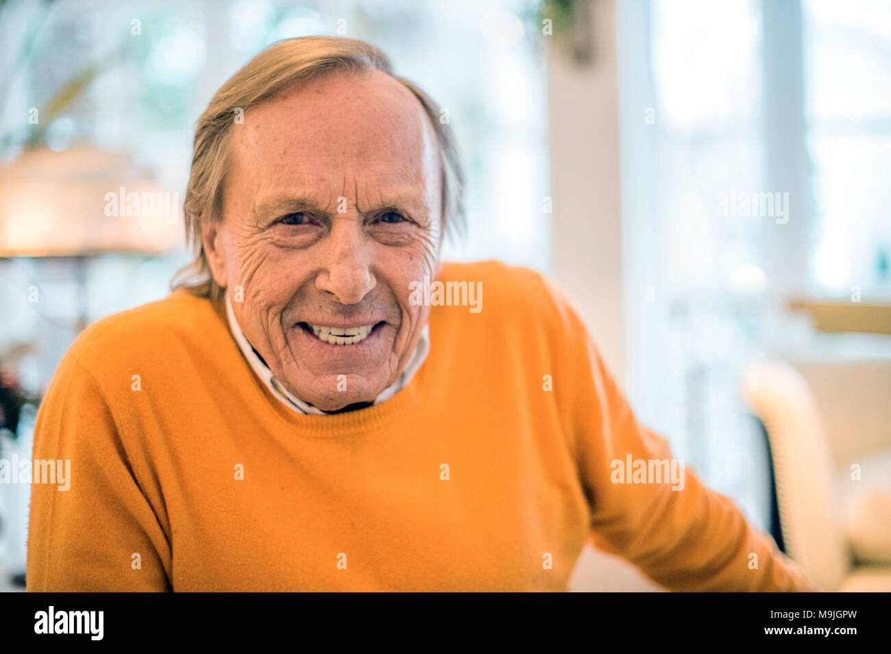 26 March 2018, Germany, Munich Actor Claus Theo Gaertner sitting in a