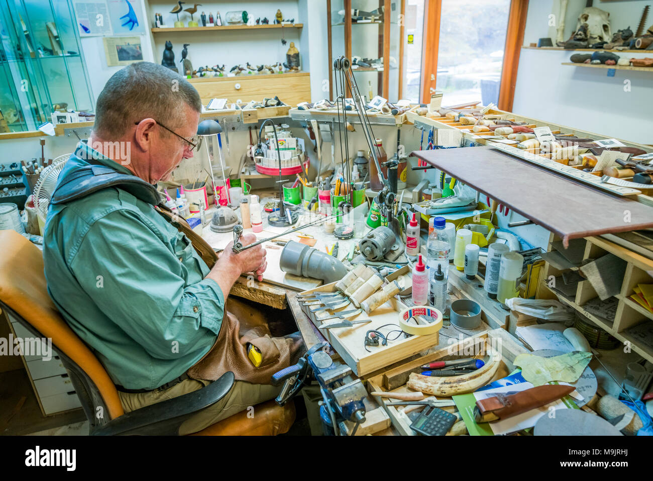 Bladesmith or knifemaker working in his shop, Iceland Stock Photo