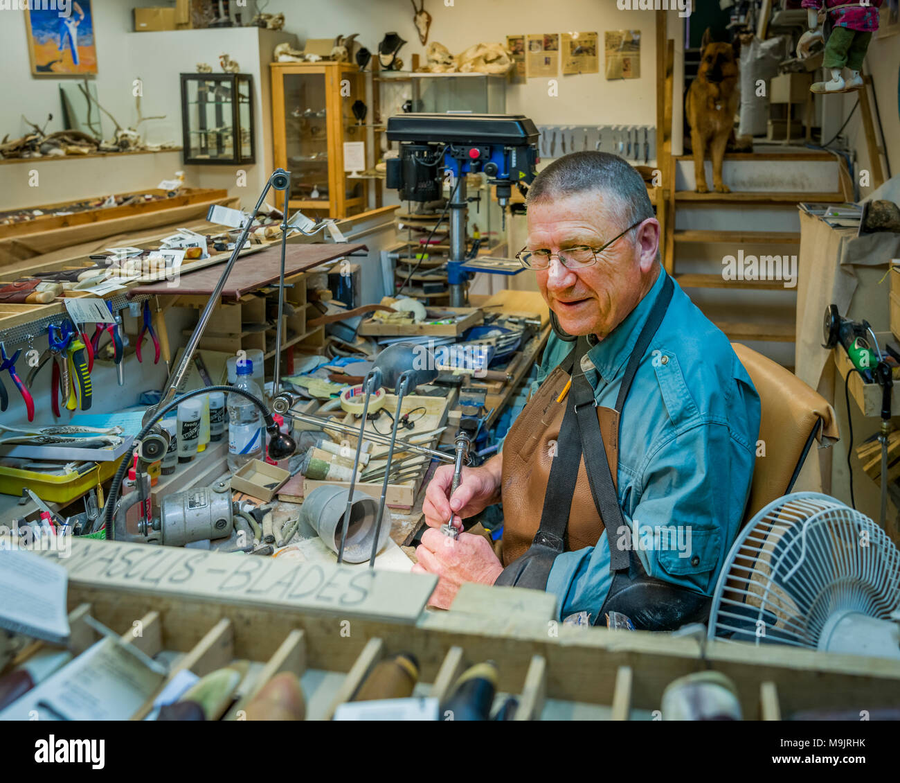 Bladesmith or knifemaker working in his shop, Iceland Stock Photo
