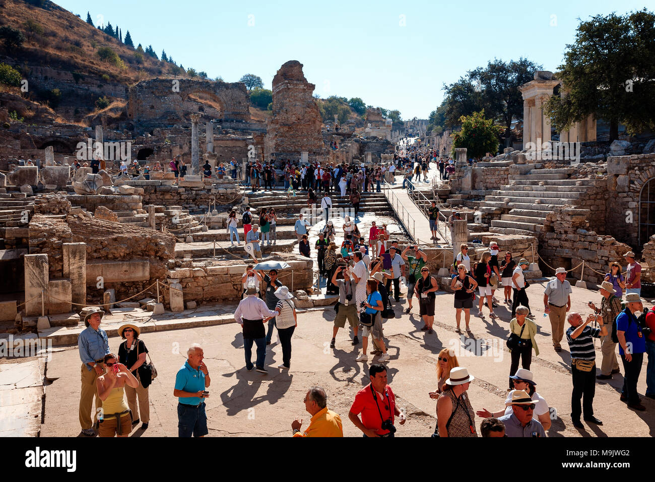 Tourists visiting Efes, gathered under the Library of Celsus. EPHESUS, TURKEY - SEPTEMBER 30, 2014 Stock Photo