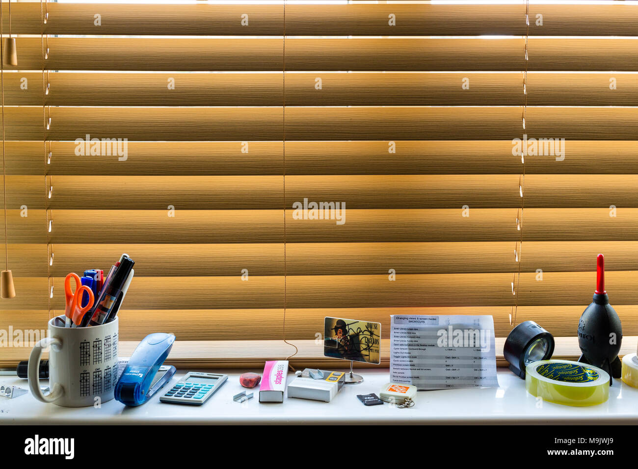 Windowsill and ventian blind in home office, Ireland Stock Photo Alamy