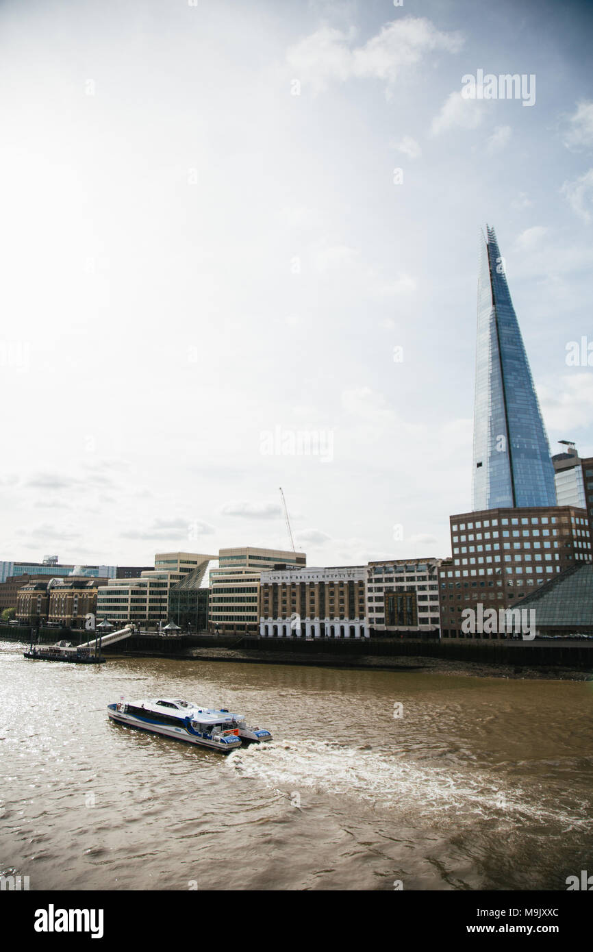 Boat and The Shard in London Stock Photo