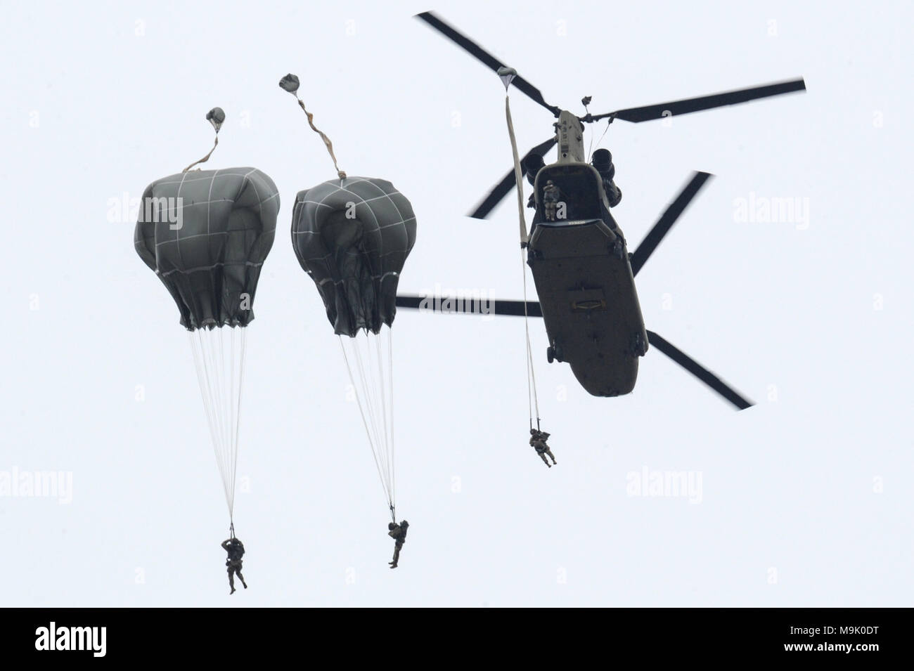 U.S. Army Paratroopers assigned to 173rd Airborne Brigade jump out of a