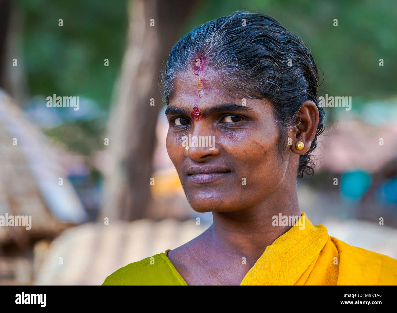 Portrait of a middle aged Indian woman looking at camera 