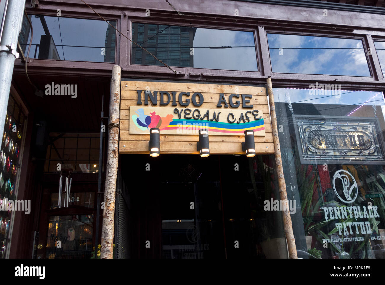 Entrance sign for Indigo Age Vegan Cafe, a vegan restaurant in downtown Vancouver. Stock Photo