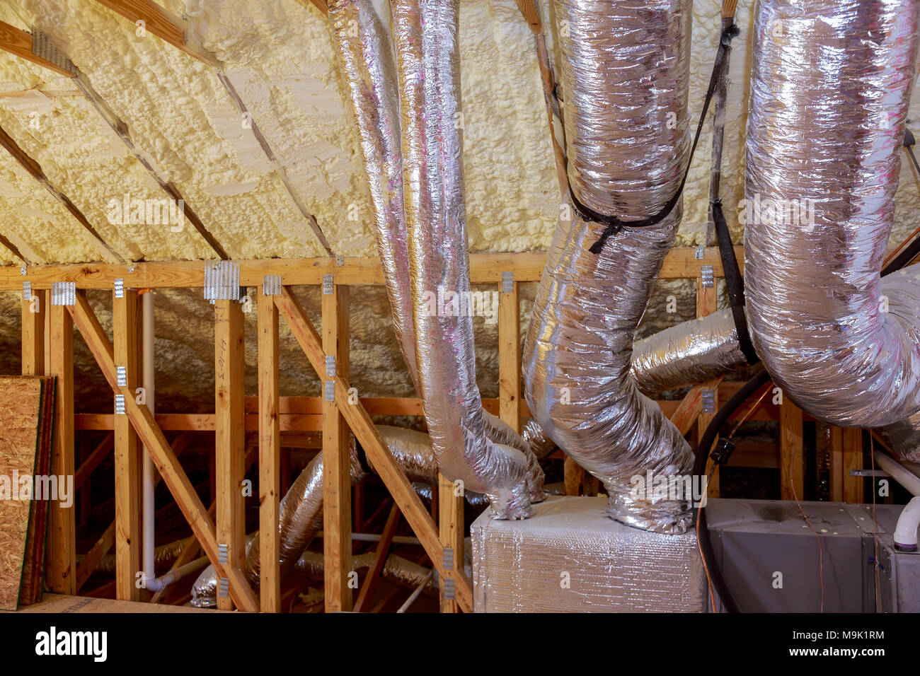 Framework showing the copper plumbing tubing and HVAC vents being