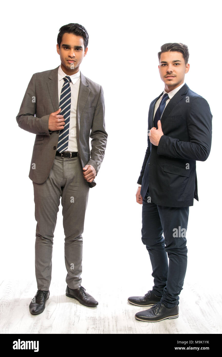 two young business man in suits in white background Stock Photo - Alamy