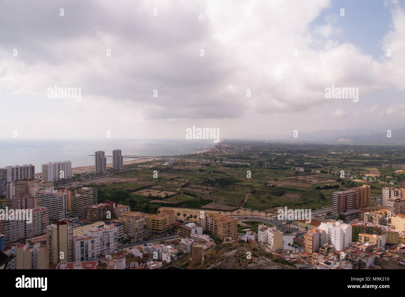 Cullera's coast in Valencia, Spain dresses from the top of the Castle and where it is possible to observe the river mouth to the sea of river Júcar Stock Photo