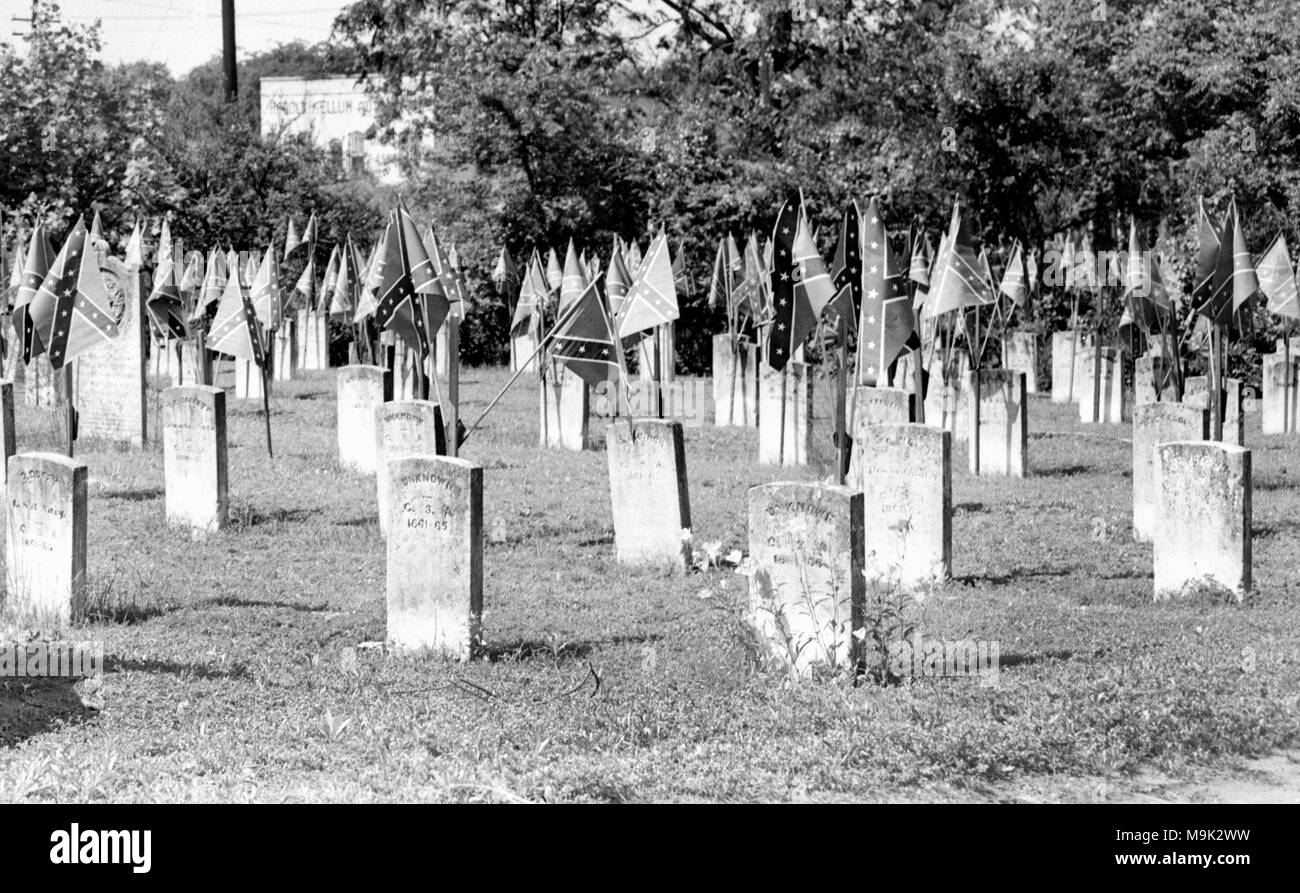 Rebel flags adorn grave markers in a Confederate Cemetery in Georgia, ca. 1952. Stock Photo