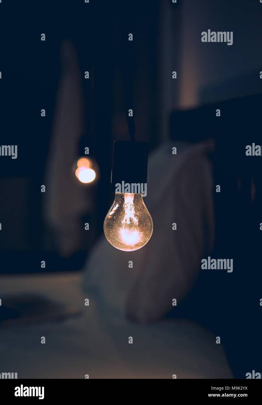 Vitange retro light in Dark blur Bed room Stock Photo