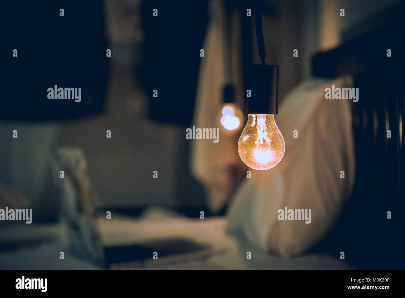 Vitange retro light in Dark blur Bed room Stock Photo
