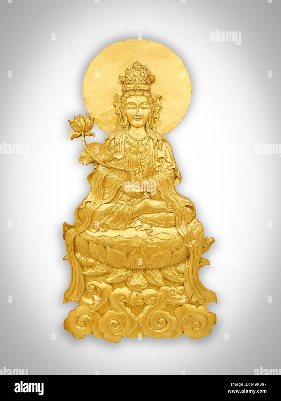 Close up Chinese God Guan Yin craft by golden wooden isolated on white