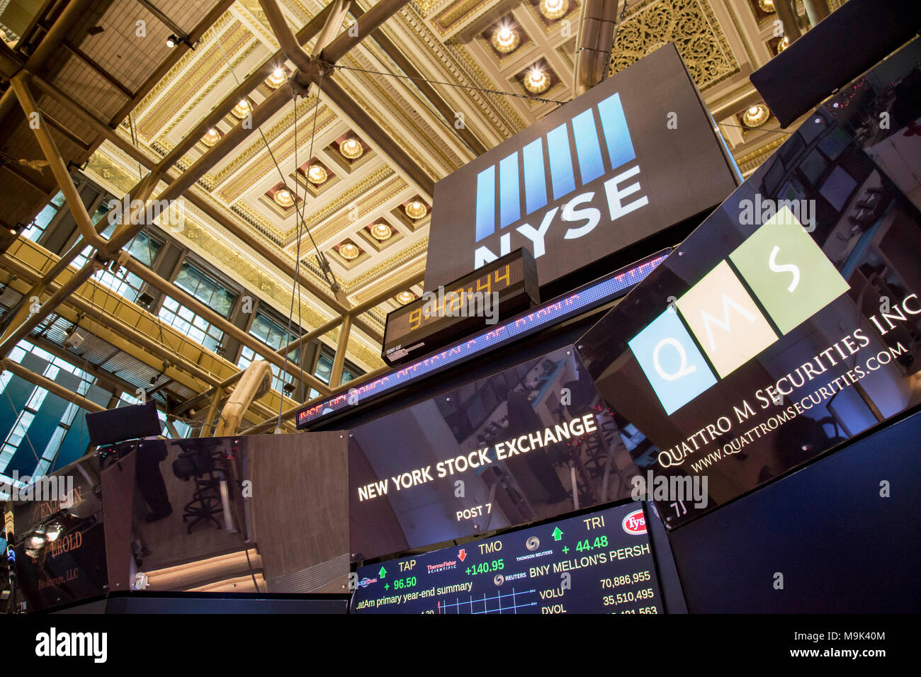 Screens overlooking the New York Stock Exchange trading floor. Stock Photo