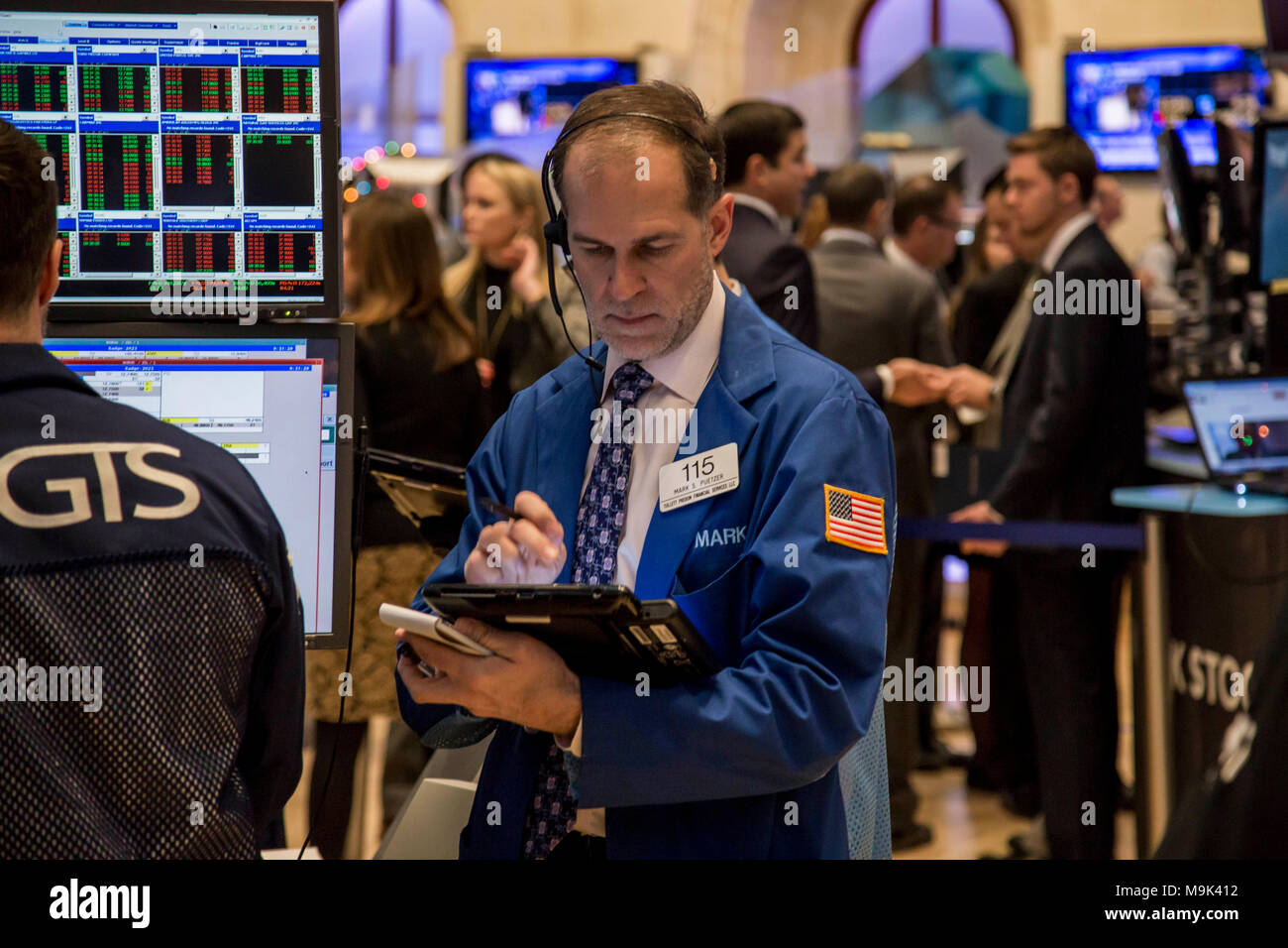 Traders on the New York Stock Exchange trading floor. Stock Photo