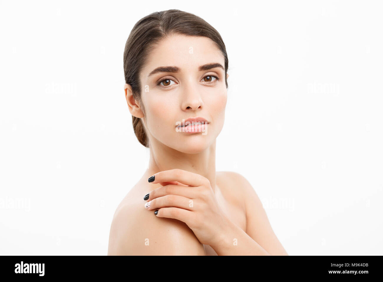 Beauty and Skin care concept - Close up Beautiful Young Woman touching ...