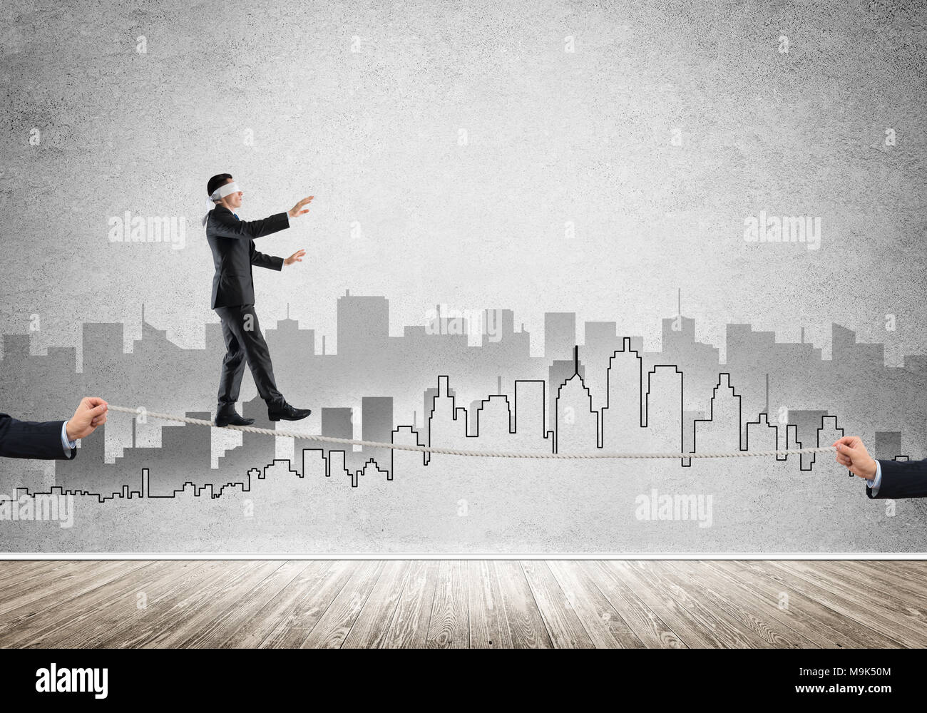 Businessman with blindfolder on eyes walking on rope Stock Photo - Alamy