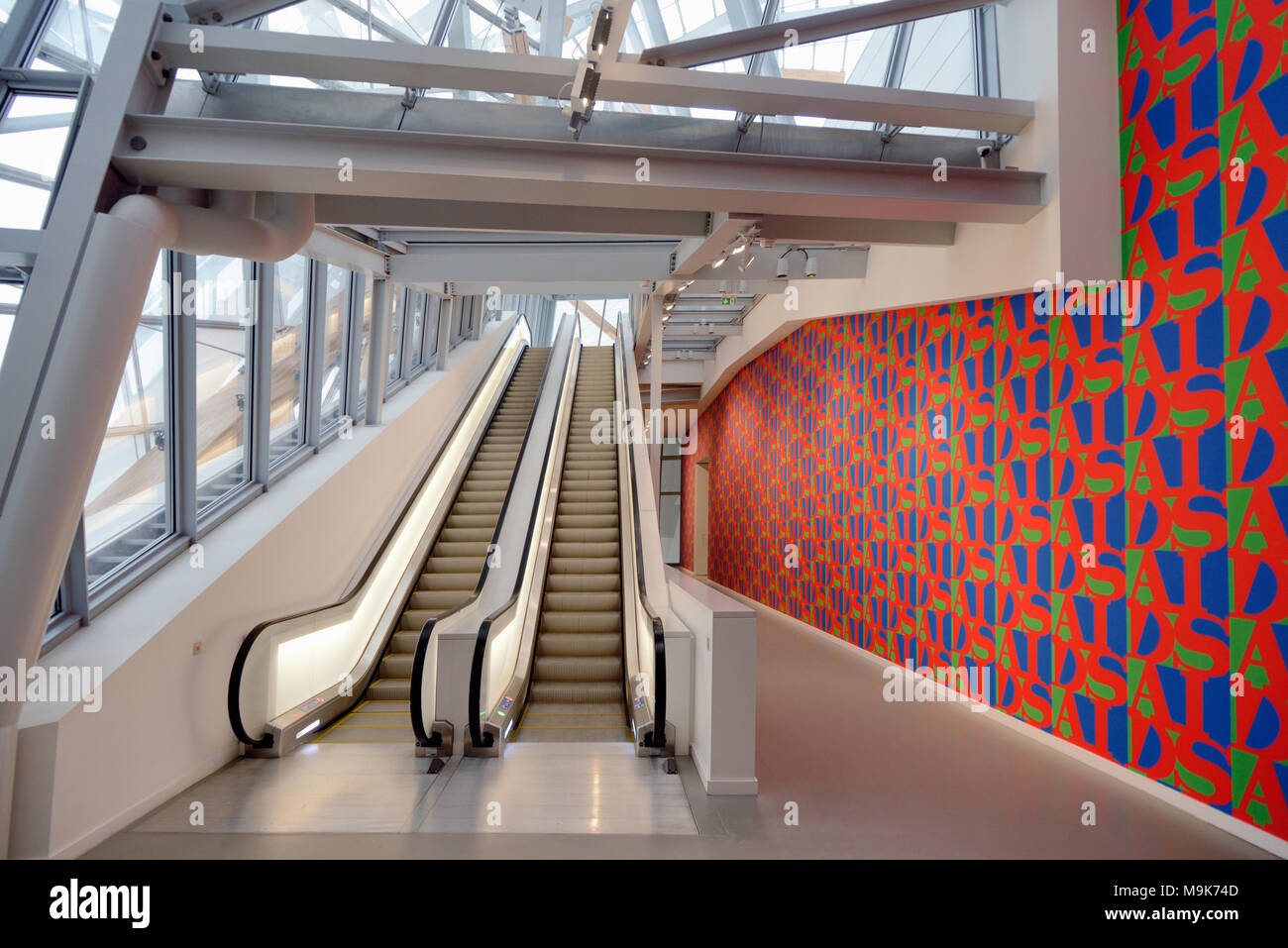 Escalators & Aids Wallpaper in Corridor of the Louis Vuitton Foundation Art Museum & Cultural Centre (2006-14) designed by Frank Gehry, Paris, France Stock Photo