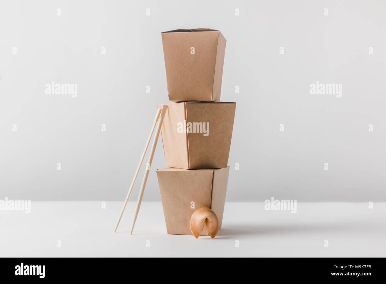 noodles boxes with chopsticks and chinese fortune cookie Stock Photo