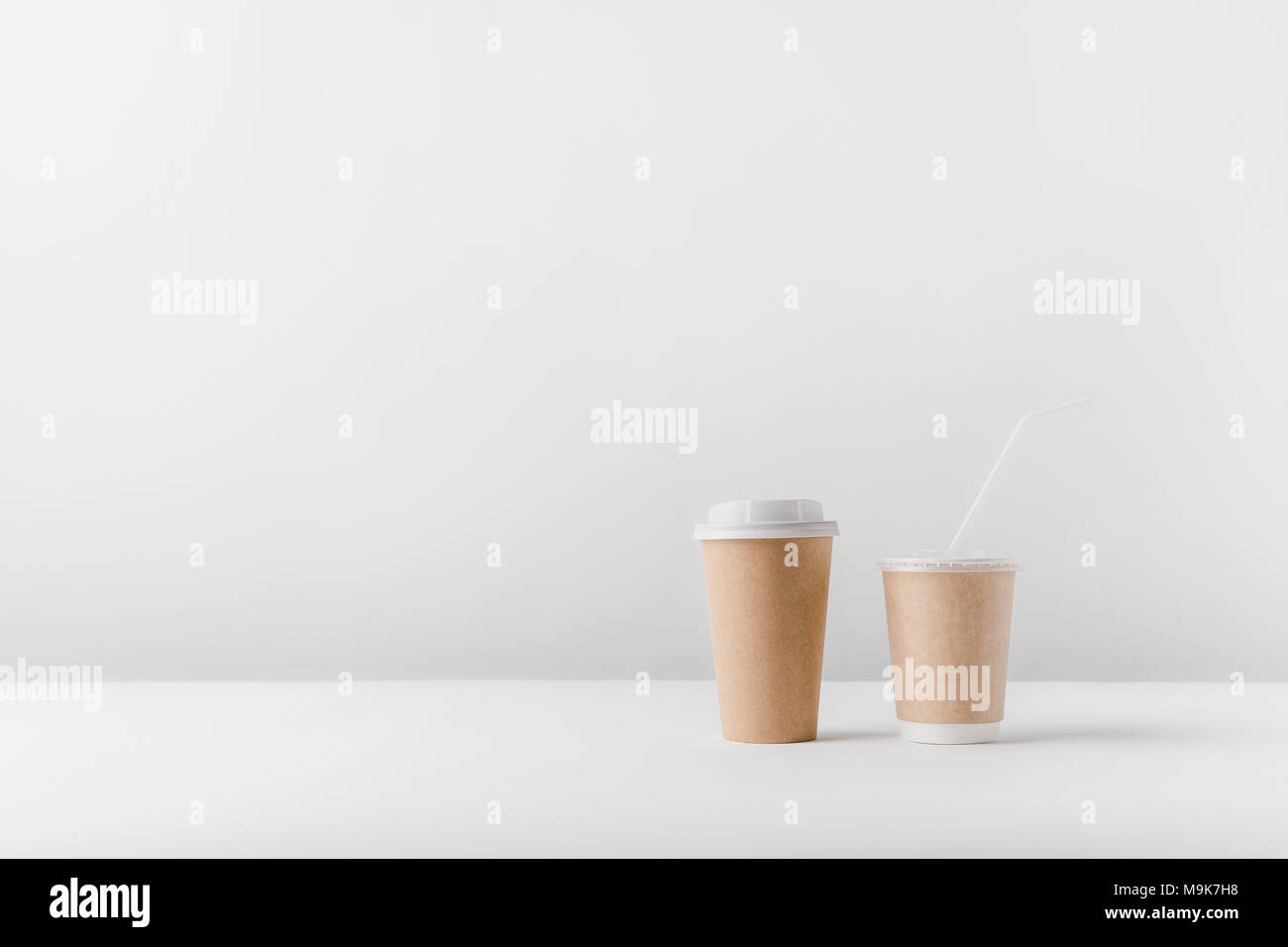 different coffee in paper cups on tabletop Stock Photo Alamy