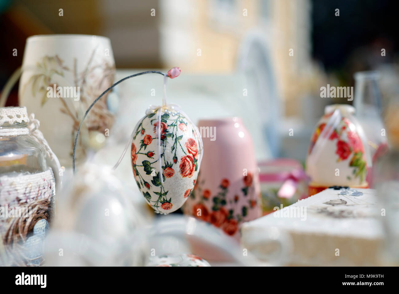 Decoupage technique. VIntage style. Shabby chic wooden boxes, glass jar and Easter egg. Stock Photo