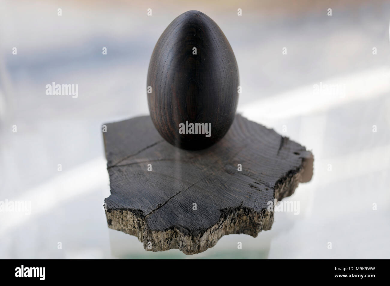 Easter egg made from most expensive wood, black ebony Stock Photo Alamy