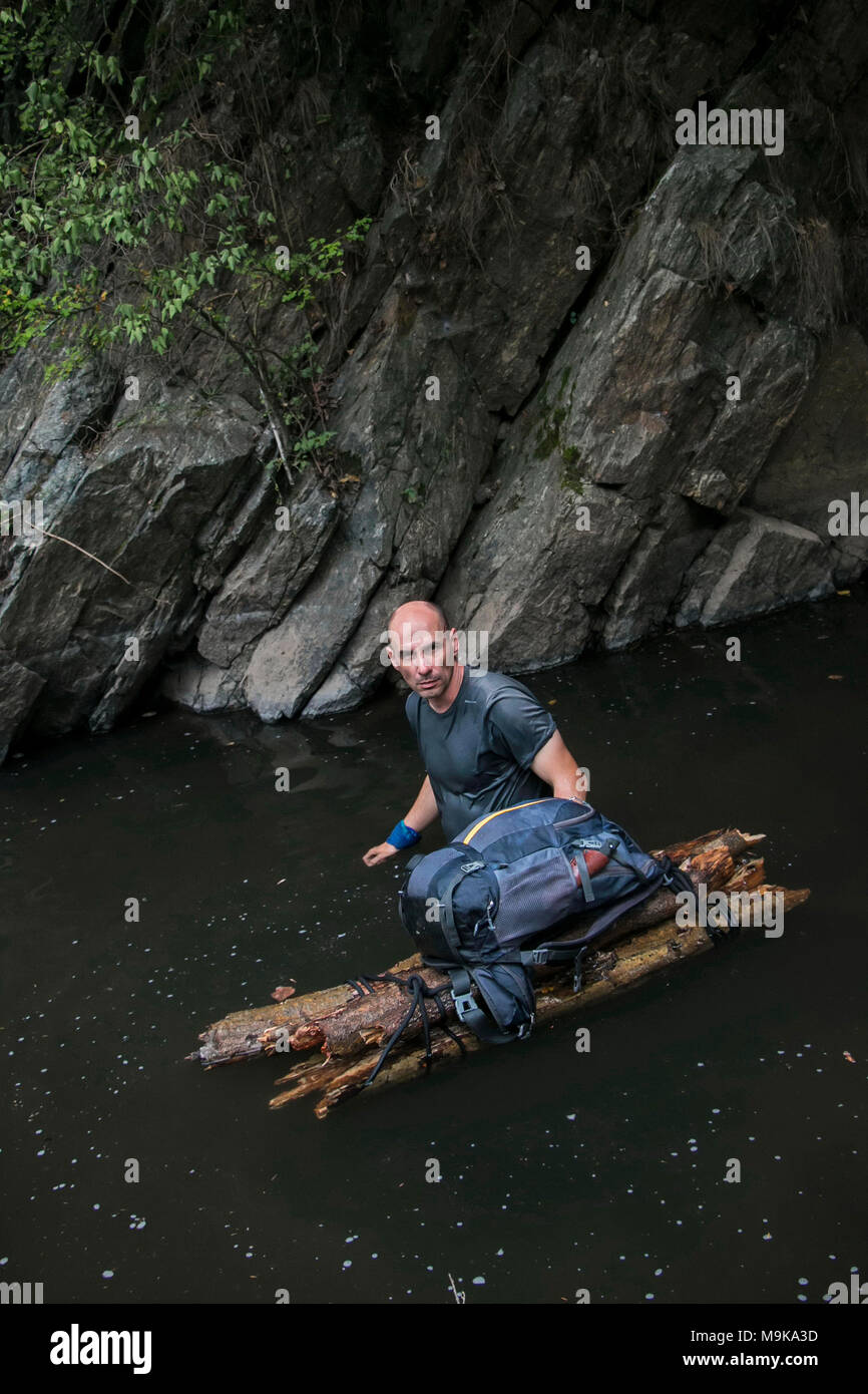 Pushing over cliff hires stock photography and images Alamy