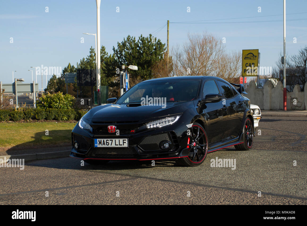 2017 black Honda Civic Gt Type R Vtec 1996cc petrol hatchback at the North-West Supercar event as cars and tourists arrive in the coastal resort on a warm spring day. SuperCars are bumper to bumper on the seafront esplanade a classic & sports car enthusiasts enjoy a motoring day out. Stock Photo