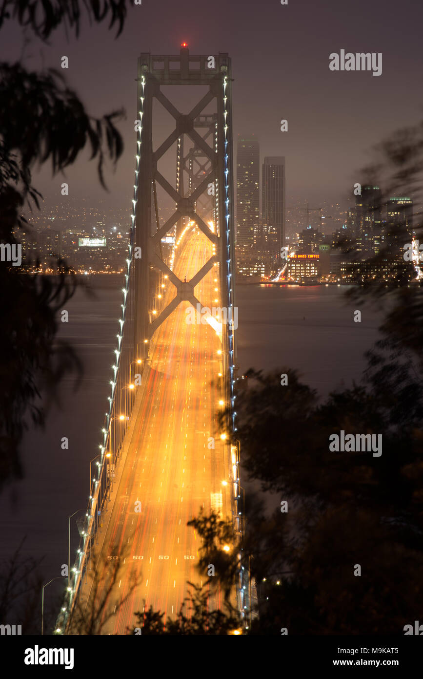 Elevated view of the Bay Bridge lit up at night, San Francisco, North Beach, California, USA Stock Photo