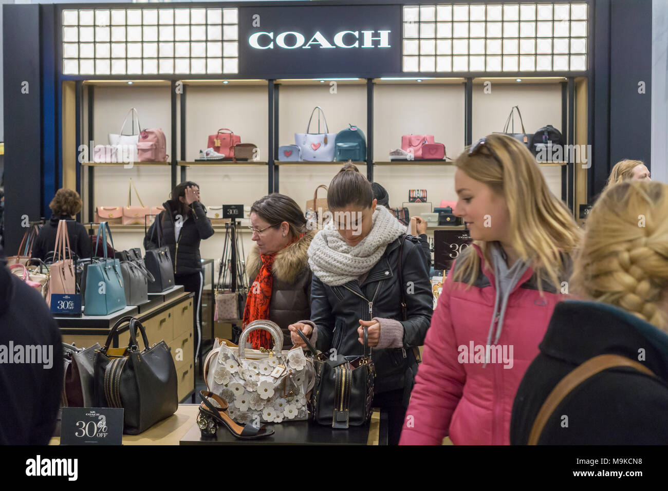 Shoppers browse Michael Kors handbags in the Macy's Herald Square flagship  store on Sunday, March 26, 2017. (Photo by Richard B. Levine) *** Please  Use Credit from Credit Field *** Stock Photo - Alamy