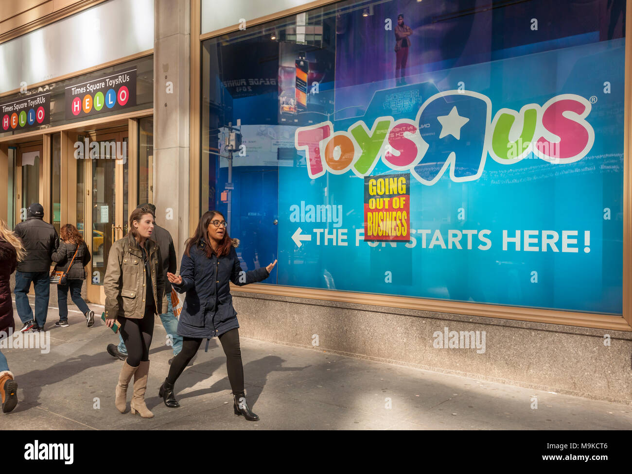 Signs posted on the window of the Toys R Us store in Times Square in New York on Friday,  March 23, 2018 announce that the store is closing and liquidation has begun. Toys R Us is liquidating and closing all 735 of its U.S. stores. The CEO of MGA Entertainment, Issac Larian, the maker of the Bratz dolls, announced a pledge of $200 million, and the creation of a GoFundMe campaign, to save approximately 400 of the 735 closing stores. (Â© Richard B. Levine) Stock Photo
