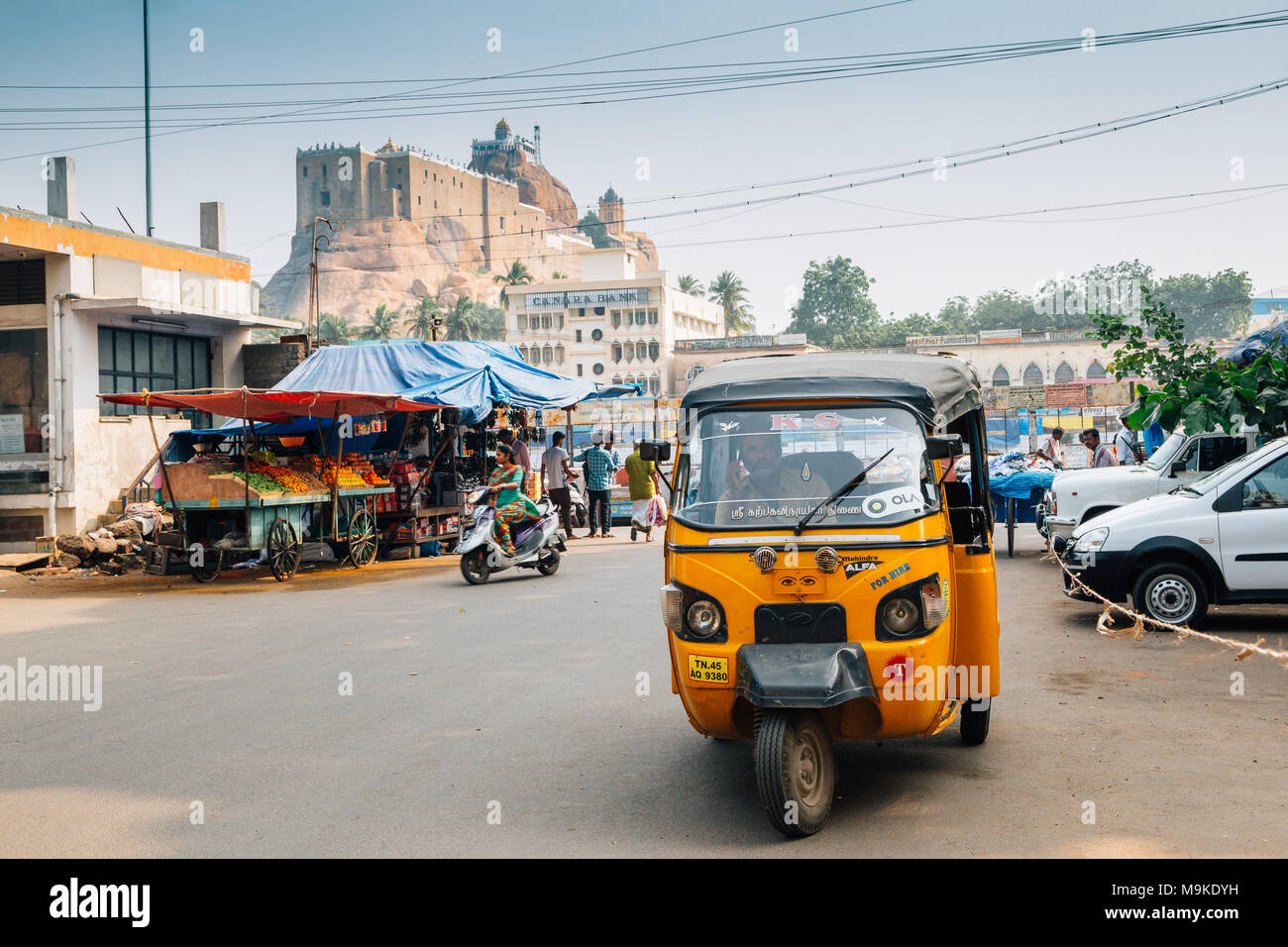 Tiruchirappalli, India - January 4, 2018 : Rockfort and street market, rickshaw Stock Photo