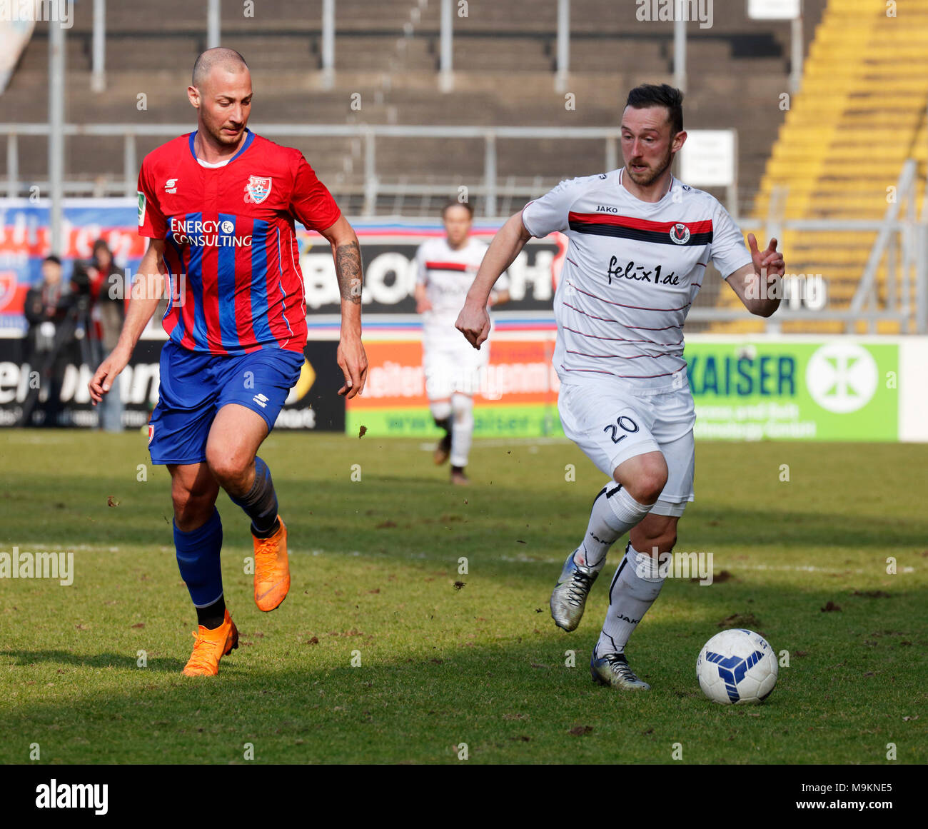 sports, football, Regional League West, 2017/2018, Grotenburg Stadium in Krefeld-Bockum, KFC Uerdingen 05 vs FC Viktoria Koeln 1904 1:1, scene of the match, Sven Kreyer (Koeln) right and Tanju Oeztuerk (Uerdingen) Stock Photo