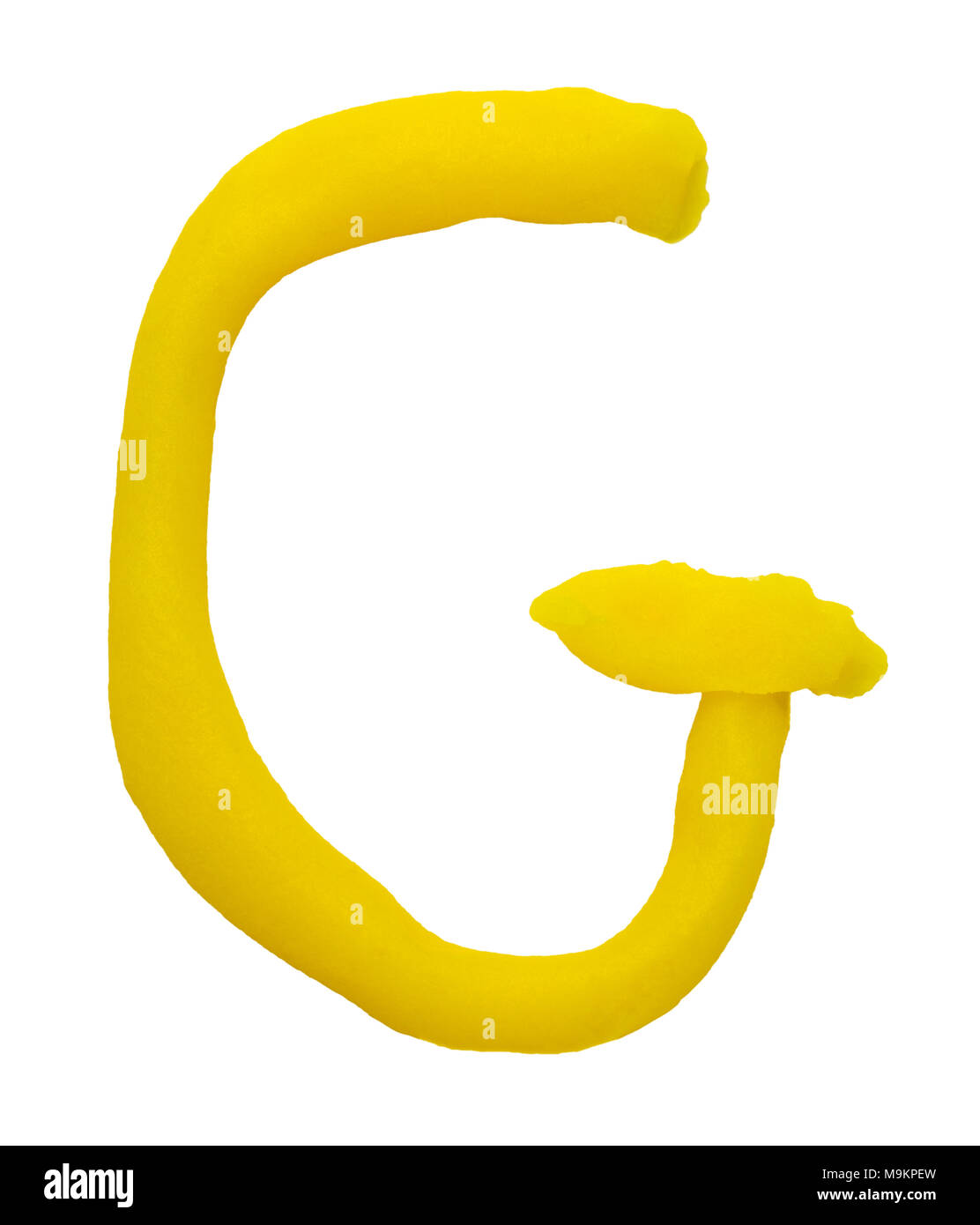 Plasticine letter G isolated on a white background. Stock Photo