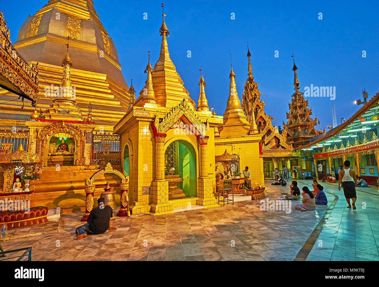 YANGON, MYANMAR - FEBRUARY 14, 2018: Sule Pagoda is famous as one of the holiest Buddhist sites in city and the outstanding architectural example of B Stock Photo