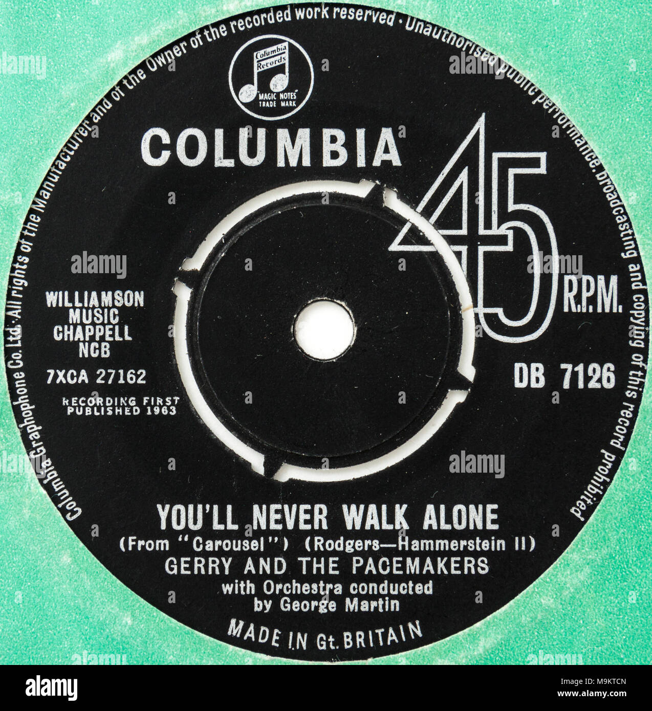 1963 original 45rpm single of 'You'll Never Walk Alone' by Gerry and the Pacemakers, famously adopted by Liverpool Football Club as their anthem. Stock Photo