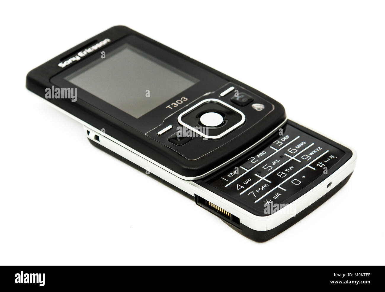 Sony Ericsson T303 mobile phone from 2008, weighing 90g and featuring a WAP browser to (very slowly) access the Internet before 3G/4G existed. Stock Photo