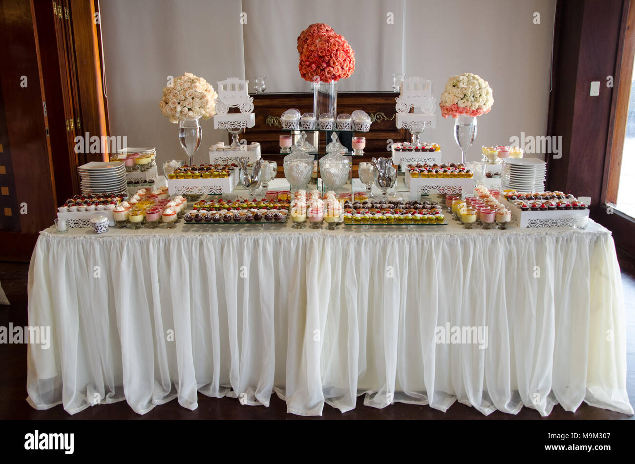 Decorating A Candy Table At A Wedding Stock Photo Alamy