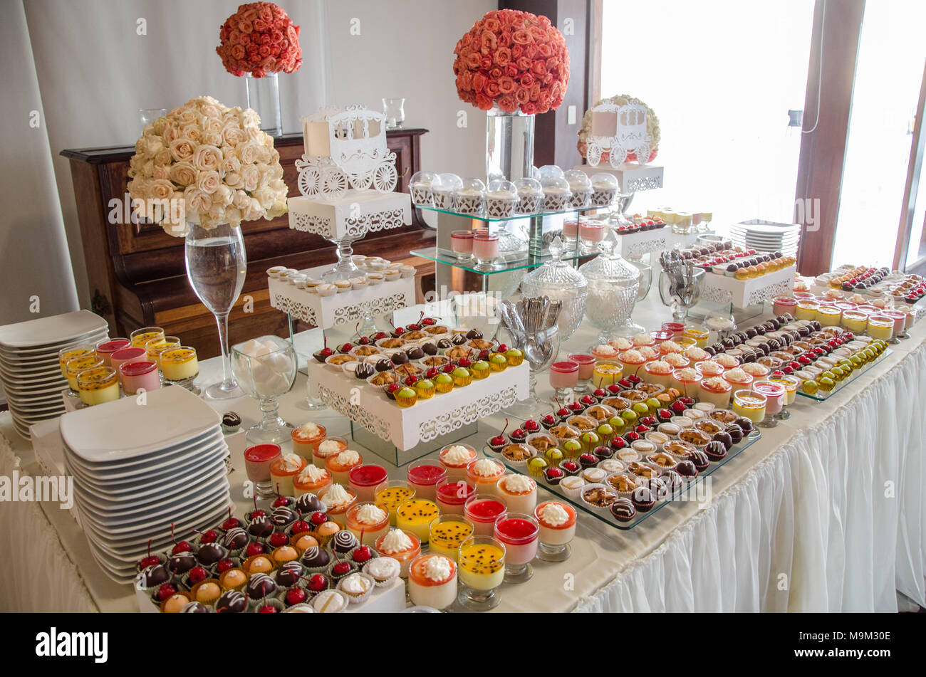Decorating A Candy Table At A Wedding Stock Photo Alamy