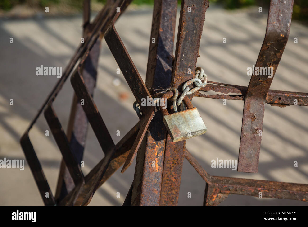 Attached to iron railings hi-res stock photography and images - Alamy
