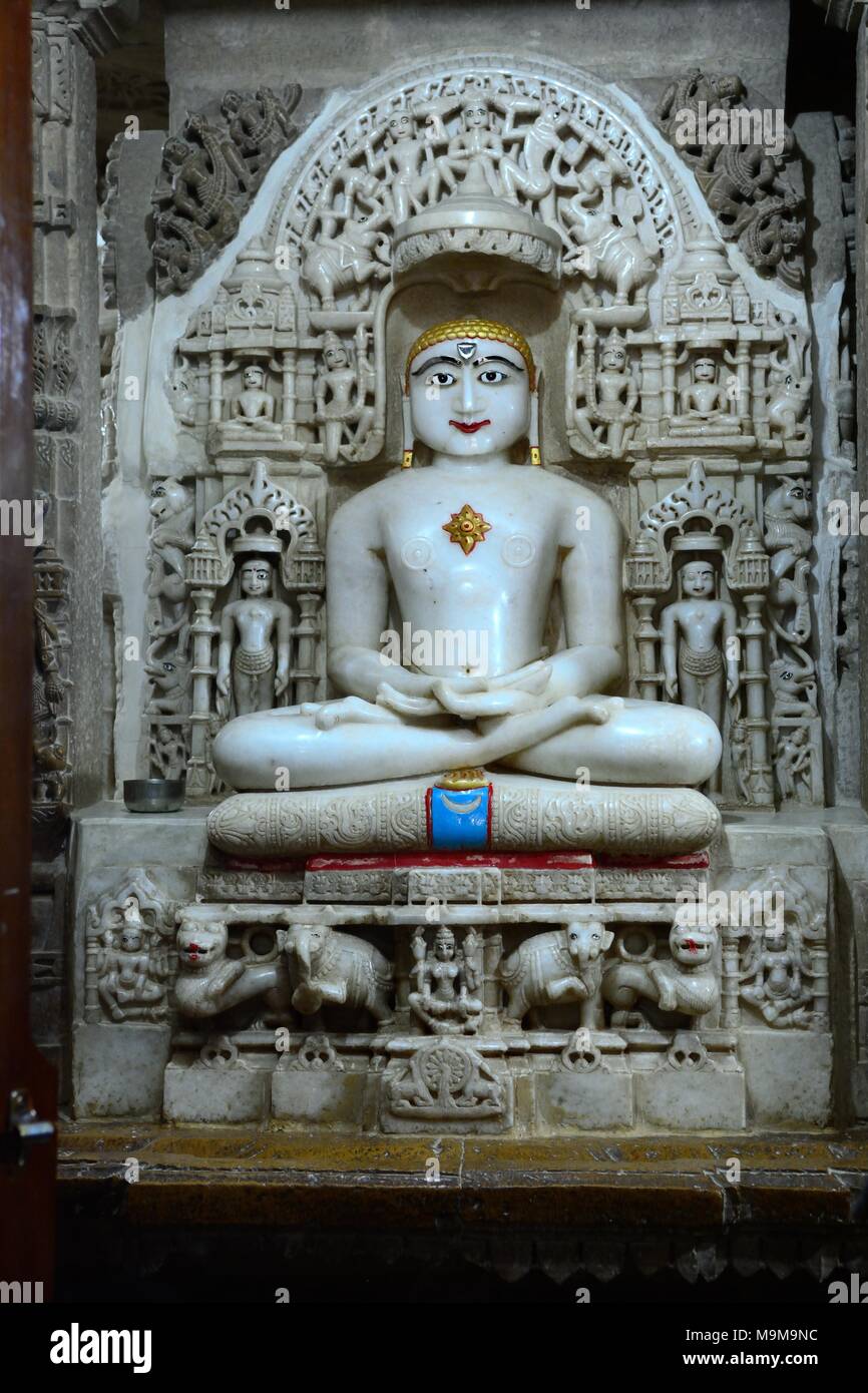 Sculpture of Mahavira or Varshamana in the elaborately carved Jain Temple Jaisalmer Rajashan India Stock Photo