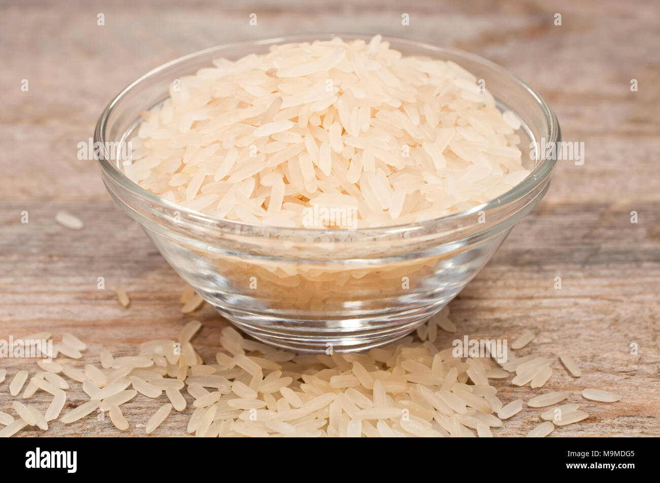 rice cereal in a glass plate on wooden table  Stock Photo