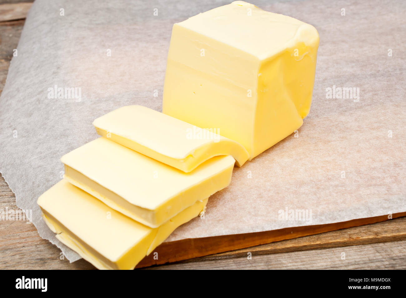 butter in parchment paper Stock Photo Alamy