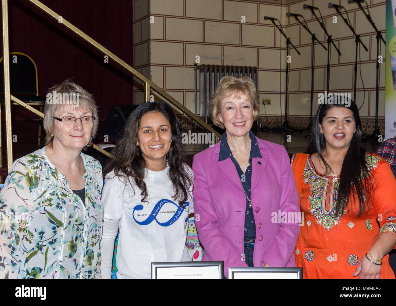 Participants in an International Women's Day event with the local MP Andrea Leadsom third from left; Northampton Guildhall, UK. Stock Photo