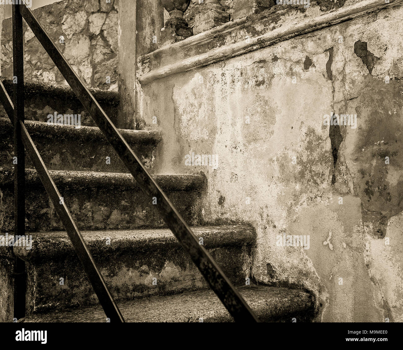 Decaying concrete steps and railing at Bunyola, Mallorca, Spain Stock Photo