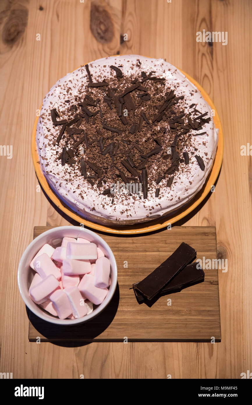 Chocolate Cake with Pink Marshmallow Icing Stock Photo Alamy