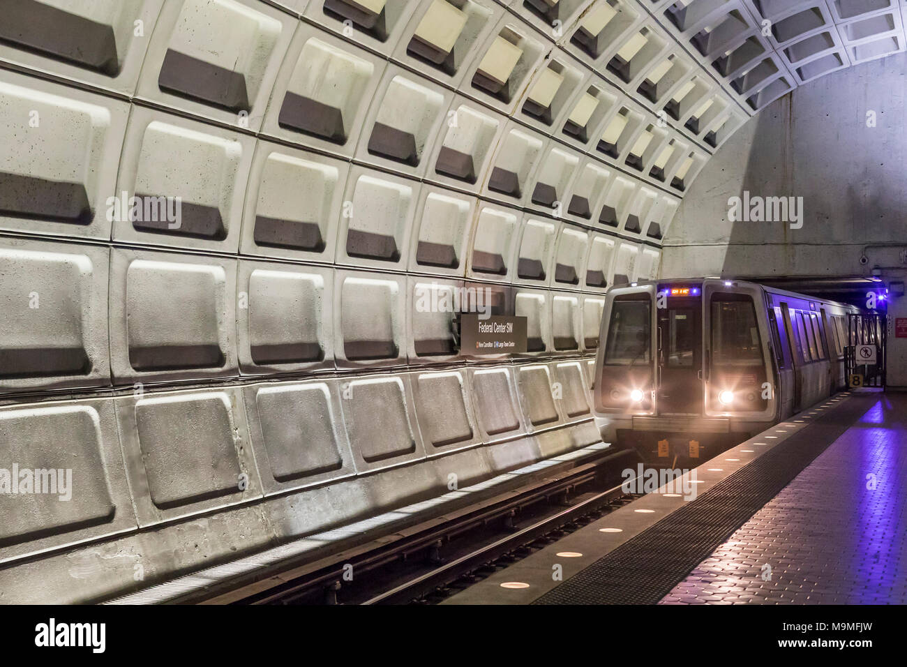 Washington, DC - A Washington Metro subway train arrives at the Federal Center SW station. Stock Photo
