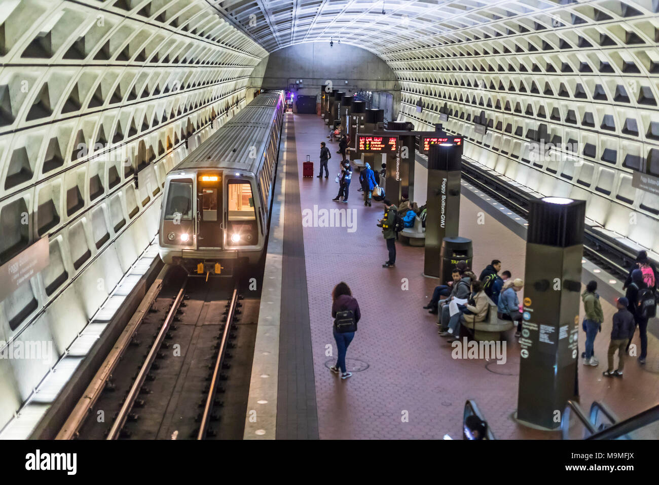 Washington, DC - A Washington Metro silver line subway train arrives at the Foggy Bottom-GWU station. Stock Photo