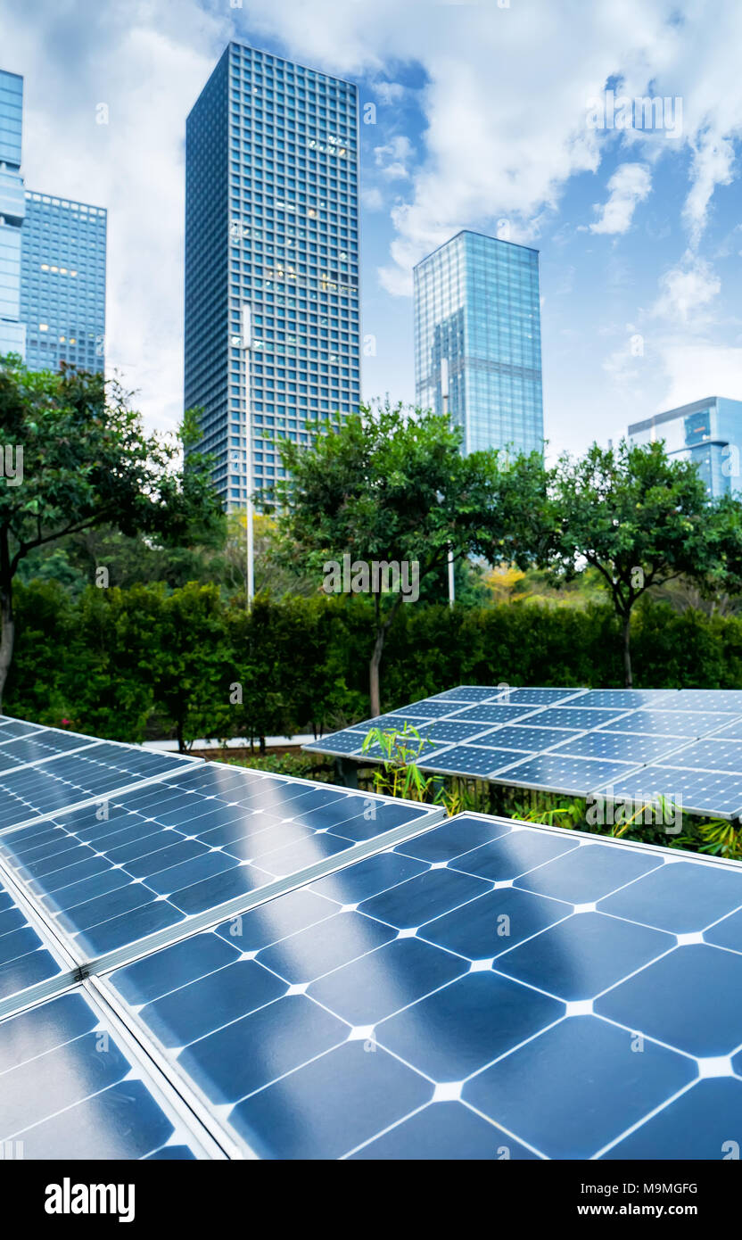 solar panel plant with urban landscape landmarks,Ecological energy
