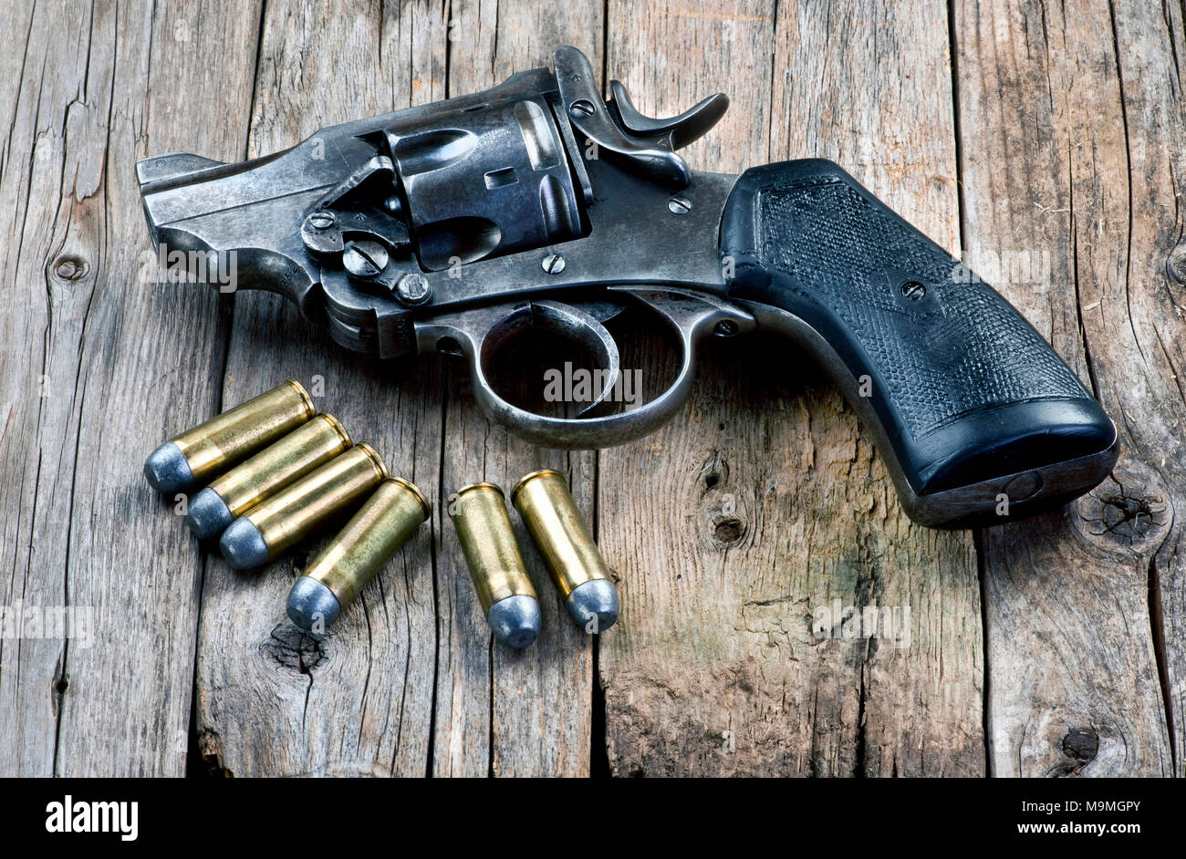 Old Snubnose 45 Pistol with six bullets. Stock Photo